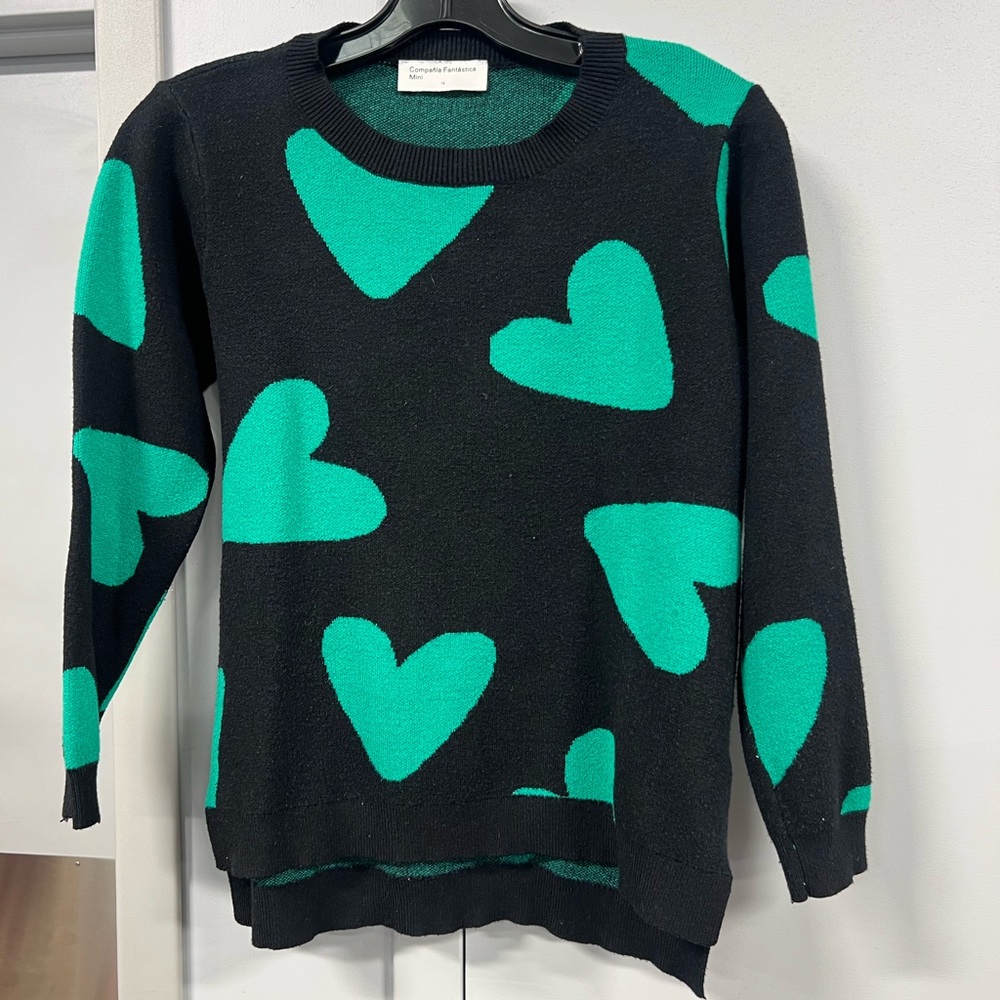 Chic Black Sweater with Green Heart Accents